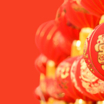traditional red Chinese lantern decorated for the Chinese New Year (Spring Festival), the Chinese characters “fa” on the lantern which means “fortune” or “rich”.