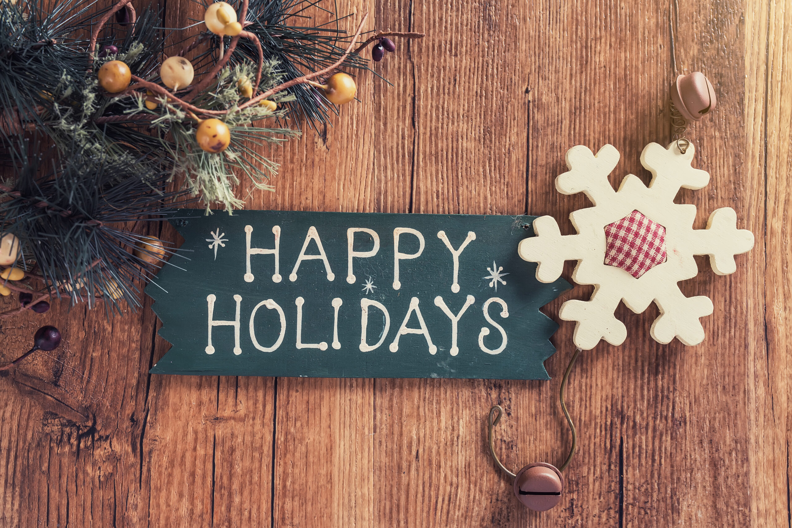 Happy,Holiday,Written,On,Wooden,Background