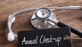 Stethoscope,On,Wood,With,Annual,Check-up,Word,As,Medical,Concept