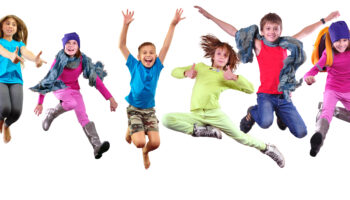 Large,Group,Of,Happy,Cheerful,Sportive,Children,Jumping,And,Dancing.