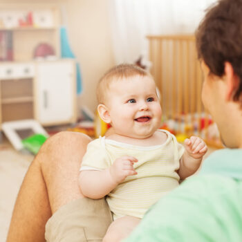 Father,With,His,Cheerful,Baby